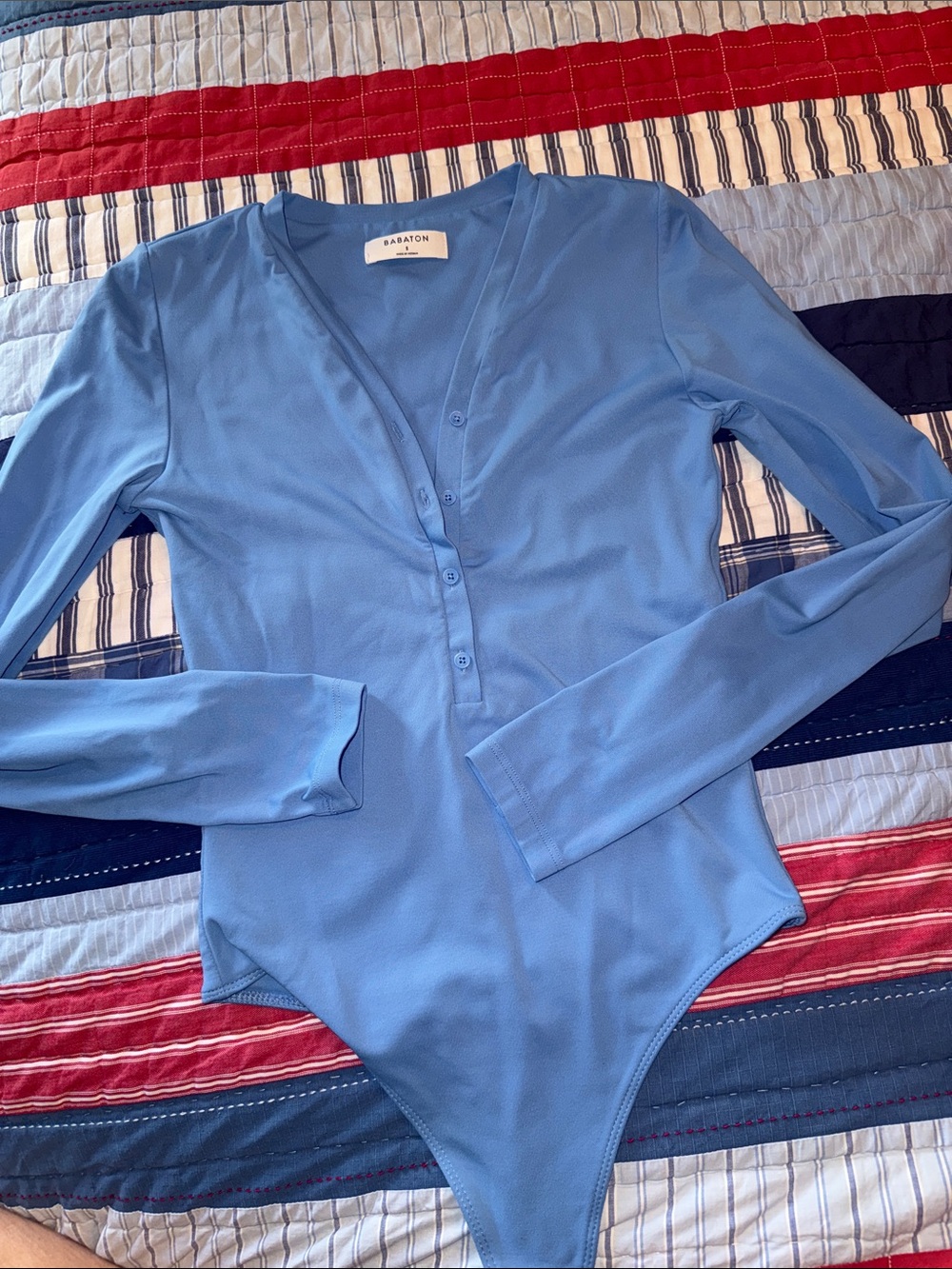 Babaton Sky Blue Long Sleeve Button bodysuit Top